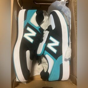 New Balance Men’s 8 / Women’s 9.5 CT 574 Black and Blue casual sneakers